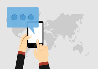 Chat icon, message on smartphone screen. Hand holds smartphone