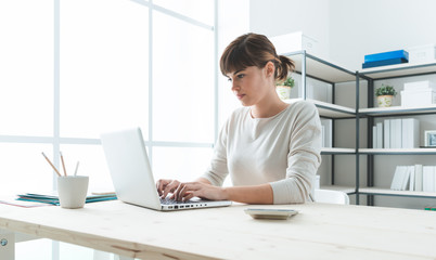 Businesswoman working at desk