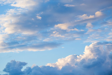 White fluffy clouds in the blue sky
