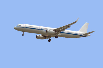 Closeup the commercial passenger aircraft isolated on blue background.