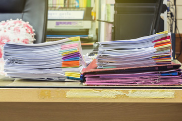 A mountain of paper symbolizing workload in an office