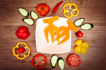 Organic healthy food background. fresh, delicious vegetables. Horizontal. Square white plate at center. Horizontal