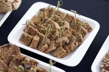 Bread cut into little squares for tasting