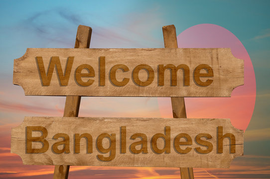 Welcome to  Bangladesh sing on wood background with blending national flag