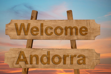Welcome to Andorra sing on wood background