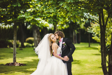 Bride and groom posing together