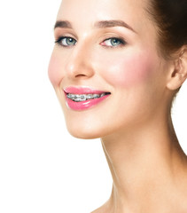 Fototapeta premium Beautiful young woman with teeth braces Broad smile girl with me