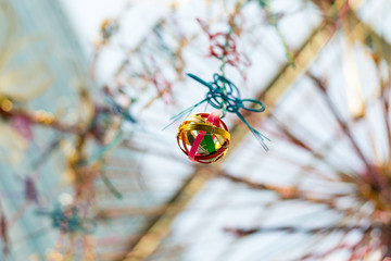 Colorful accessories hanging from the ceiling