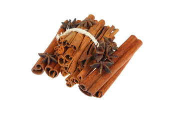 Cinnamon sticks and star anise spice isolated on white