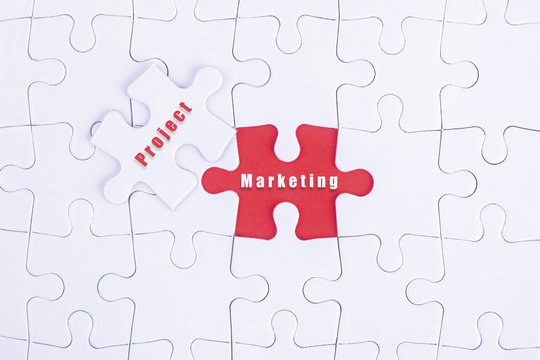 Missing white puzzle with Project, Marketing  word and copyspace