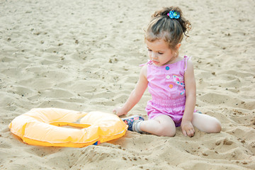 Baby girl inside the sea