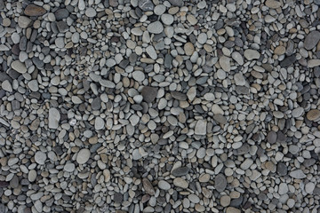 Nature background from gray sea pebbles