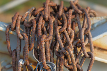 Rusty chain on gate closeup