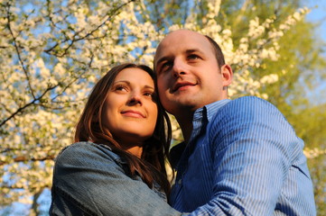 Portrait of happy couple enjoying spring in park.Dating. Love story