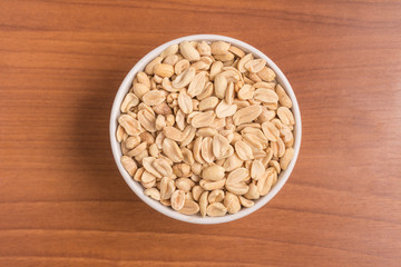 Peanuts into a bowl