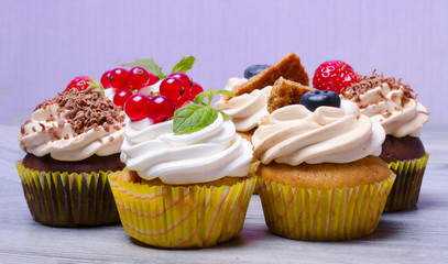 delicious, fresh cupcakes with fresh berries