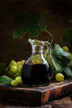 Balsamic vinegar, vintage rustic background, selective focus