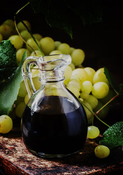 Balsamic vinegar, vintage rustic background, selective focus