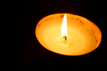 
red candle under the white background