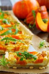 Pumpkin tart with cheese and nuts.