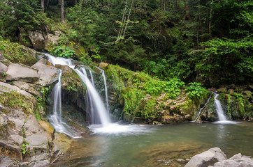 Mountain river with waterfall and rocks at national park in the Skole Beskids near Lviv