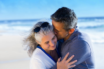 romantic portrait of mid aged couple in love - 118384604