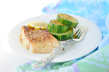 Grilled fish (cod) with zucchini.