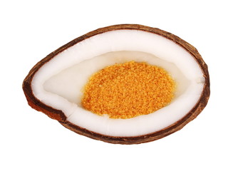 Coconut half and coconut sugar isolated on white
