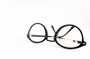 Fototapeta na wymiar Modern stylish fashionable elegant black eyeglasses on white bac