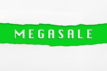 Torn paper with a MEGASALE word on red background
