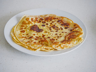 Plate with pancakes.