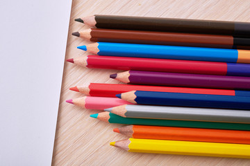 colored pencils and paper