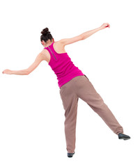 Balancing young woman.  or dodge falling woman. Rear view people collection.  backside view of person.  Isolated over white background. dark-skinned girl in a red shirt is balancing on his leg.