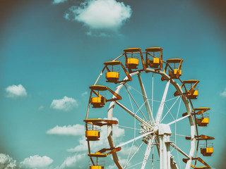 Ferris Wheel In Fun Park On Blue Sky