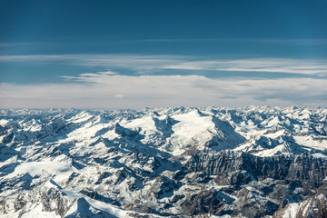 Fototapeta premium over the mountain peaks covered with snow at winter in austrian alps