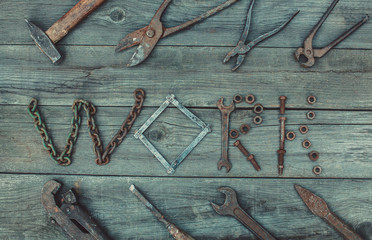 In the old, wooden, cracked, the work surface is lined with the word 