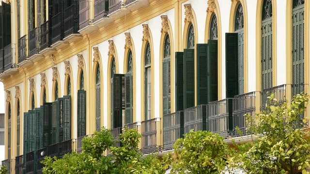 Open balconies in old town of Malaga, Spain