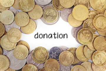 Background of the gold coin with word donation in the middle.