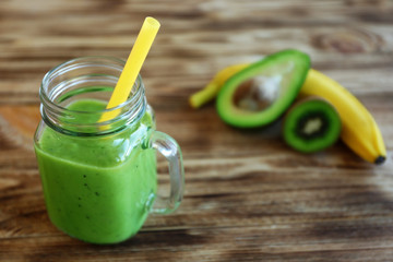 Fresh fruit cocktail on wooden background