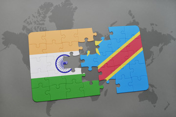 puzzle with the national flag of india and democratic republic of the congo on a world map background.