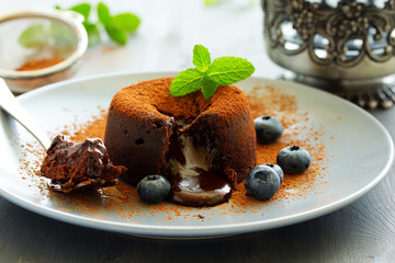Fondant- delicious chocolate dessert with blueberries.