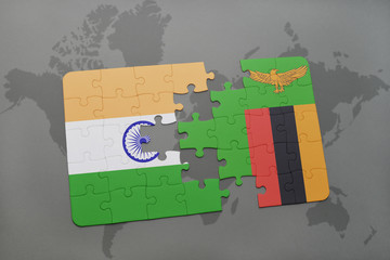 puzzle with the national flag of india and zambia on a world map background.