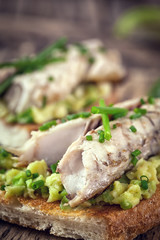 Sandwich with fish and avocado 