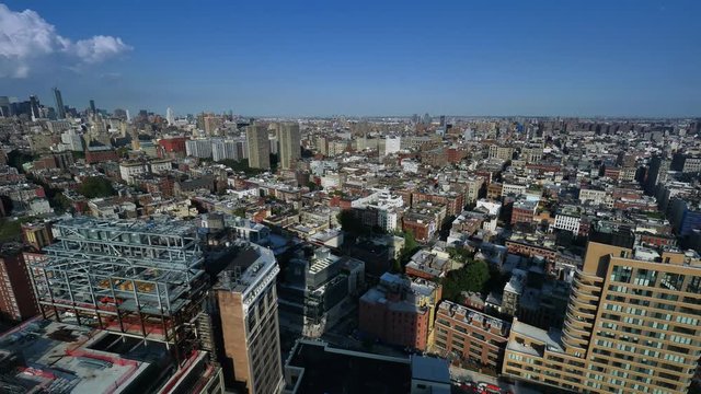 A daytime summer time lapse over SoHo in lower Manhattan.	