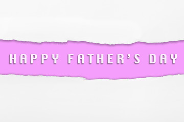 Torn paper with a HAPPY FATHER’S DAY word on PINK background