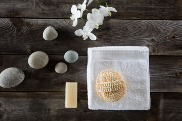 top view for detox spa with cleansing loofah and zen symbols