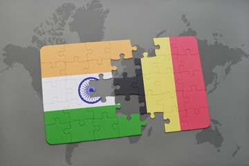 puzzle with the national flag of india and belgium on a world map background.