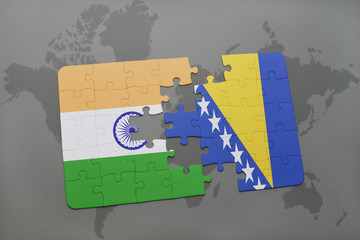 puzzle with the national flag of india and bosnia and herzegovina on a world map background.
