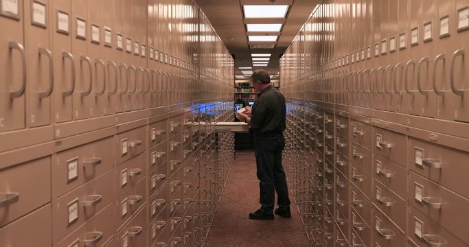 Man at Microfilm storage Genealogy LDS Church Utah. Church of Jesus Christ of Latter-day Saints or Mormon Church Headquarters. Largest genealogical collection in world resources.