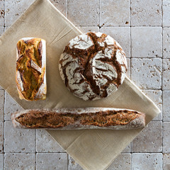 top view of organic whole wheat breads set with geometry